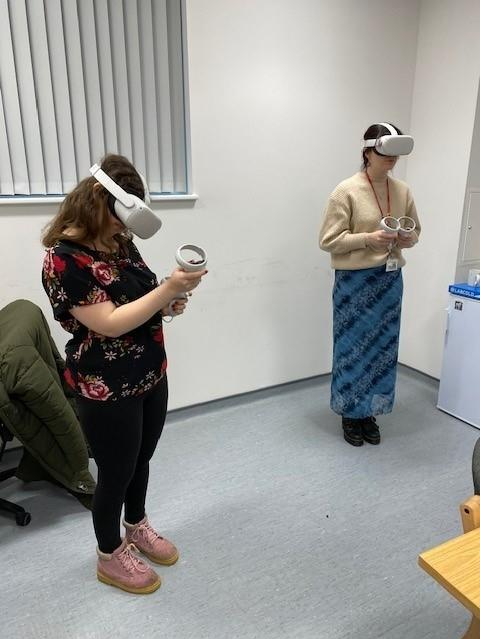 Scientists trying the crossmatching VR simulation.